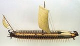 A trireme (from Latin triremis, literally 'three-oarer') was a type of galley, a Hellenistic-era warship that was used by the ancient maritime civilizations of the Mediterranean, especially the Phoenicians, ancient Greeks, Persians and Romans.<br/><br/>

The trireme derives its name from its three rows of oars on each side, manned with one man per oar. The early trireme was a development of the penteconter, an ancient warship with a single row of 25 oars on each side, and of the bireme, a warship with two banks of oars, probably of Phoenician origin. As a ship it was fast and agile, and became the dominant warship in the Mediterranean from the 7th to the 4th centuries BC, when they were largely superseded by the larger quadriremes and quinqueremes. Triremes played a vital role in the Persian Wars, the creation of the Athenian maritime empire, and its downfall in the Peloponnesian War.